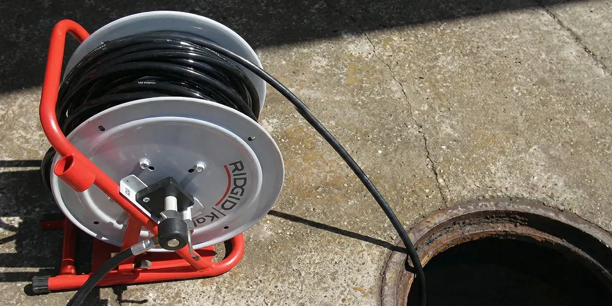 sewer rodding equipment prepared to clear clogged sewer lines in Nashville, TN